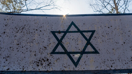Symbol of Judaism or Star of David. Six-pointed star in a centre of composition in beams of the...