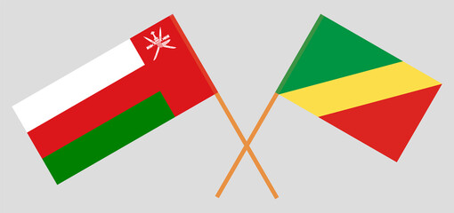 Crossed flags of Oman and Republic of the Congo. Official colors. Correct proportion