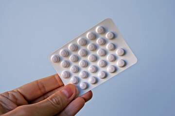 Blister pack of pills on hand 