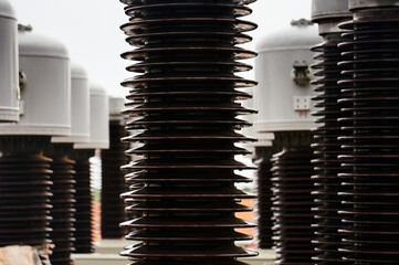 detail of glass insulators part of the high voltage electrical transmission towers
