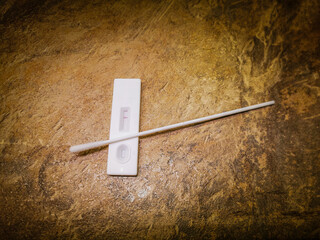Quick Covid-19 test kit at home showing a negative test result