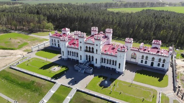 View on the old castle-palace Puslovsky, national landmark. Kossovo, Belarus. Aerial video 4K