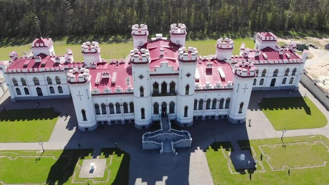 View on the old castle-palace Puslovsky, national landmark. Kossovo, Belarus. Aerial video 4K