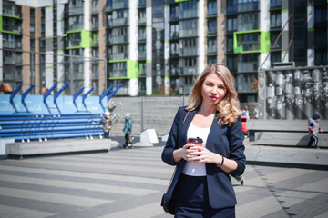Fototapeta premium Business woman with a cup of coffee