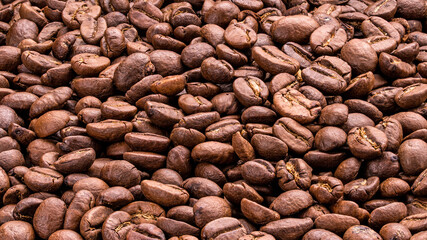 Coffee beans. Dark Roast Coffee whole bean. Food photography. Macro High resolution photo Full depth of field Isolated on black background. Good for cafe, restaurant, shop, banner, posters, billboards