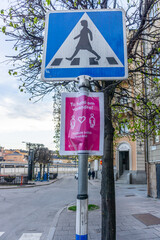 Laminated paper sign with a reminder about keeping distance because of spreading of Covid in Sweden