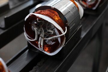 stator with copper coil on assembly line of Semi-automated manual production. electric motors...