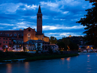 Fototapeta premium Night cityscape of Italian city Verona with Adige river and Old Bridge
