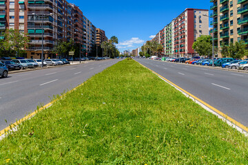 Valencia, Spain - May 14, 2021: Main avenue of the city of Valencia, Ausias March, without traffic or cars circulating.