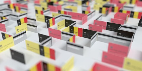 National flag of Belgium on the mockup credit card maze. Financial difficulties related 3D rendering