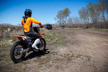 Motocross rider gets ready to hit the track.