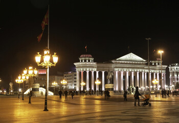 Fototapeta premium Skopje town square behind Archeology Museum at night in Macedonia. It is located in the central part of the city.