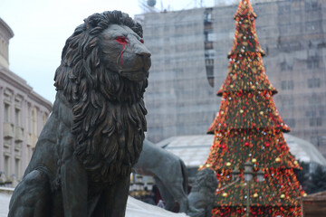 Lion statue at Skopje town square in Macedonia. It is located in the central part of the city, and...