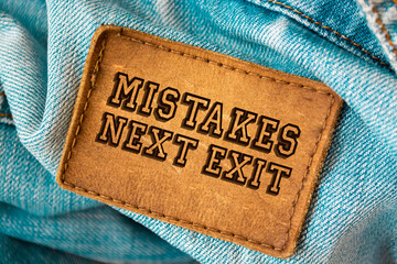 Text sign showing Mistakes Next Exit