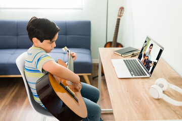 Elementary boy taking private music lessons