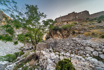 San Giovanni Fortress in the distance on top of a rocky hillside,Kotor,Montenegro.