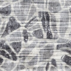 Seamless grungy tribal ethnic rug motif pattern. High quality illustration. Distressed old looking native style design in shades of gray and cream. Old artisan textile seamless pattern.