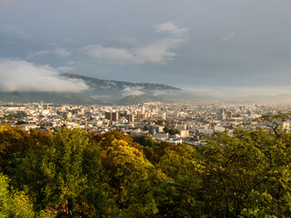 Obraz premium Central Matsumoto city at sunset, scenic view from Joyama park observation tower - Nagano prefecture, Japan