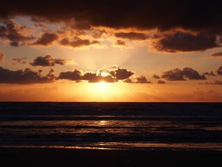 Fototapeta na wymiar Sunset at a North Sea beach at Bloemendaal aan Zee