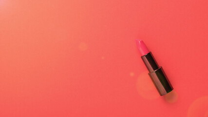 Bright red lipstick on a bright red background.