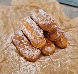 eclairs with powdered sugar