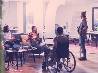 Pregnant Businesswoman Leads Creative Meeting Of Business Team In Modern Coworking open Space Office