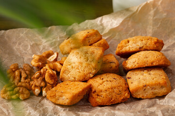 Baked small cheese cookies heap close up