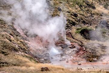 Fototapeta na wymiar Eruption of Old Faithful geyser at Yellowstone Nationl park