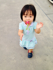 little girl with lollipop