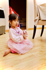 little girl in pink dress