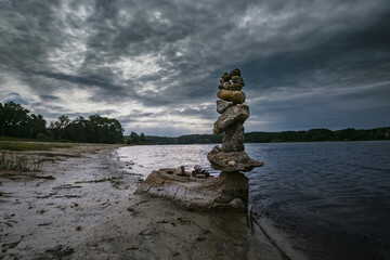 stone arrange in balance in the bank of the river