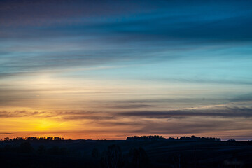 sunset over the field	