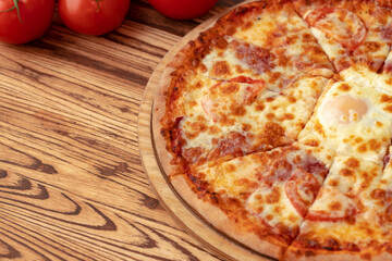 Freshly baked pizza on table close up