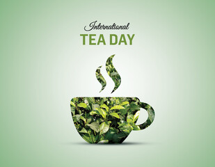 International Tea Day concept background. Tea leaves isolated on the teacup concept for...