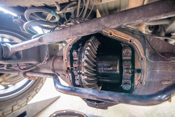 Changing heavy duty oil on a pick up truck rear axle differential - obrazy, fototapety, plakaty