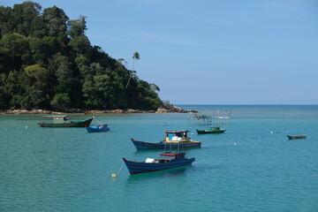 Fototapeta na wymiar Indonesia Anambas Islands - Jemaja Island Padang Melang Beach anchoring fishing boats