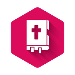 Obraz premium White Holy bible book icon isolated with long shadow. Pink hexagon button. Vector Illustration