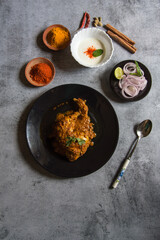 Indian moghul dish chicken chap prepared with big pieces of chicken meat in rich spicy gravy. A popular item of the moghul cuisine.