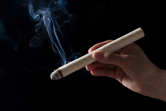 close up of hand holding professional moxa stick