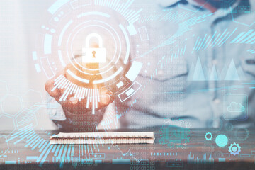 Businessmen use smartphones to touch the lock on the computer to protect the global technology security system. The idea of ​​online digital link to cyber security on high tech.
