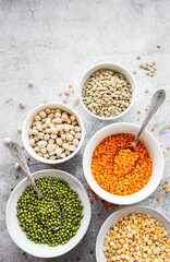 Bowls with different types of legumes