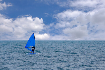 The blue sailboat on holiday, A ship on the horizon