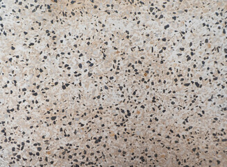 Tile texture with black and white pebbles