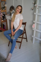 Cute girl on a chair