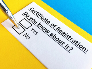 One person is answering question about certificate of registration.