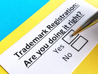 Obraz premium One person is answering question about trademark registration.