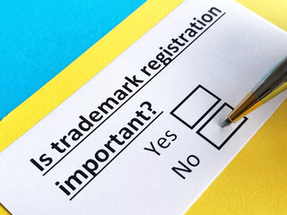 Obraz premium One person is answering question about trademark registration.