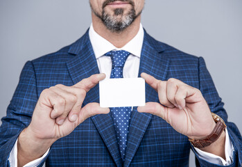 For keeping introduction formal. Business card in male hands. Formal introduction. Contacts