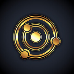 Gold Solar system icon isolated on black background. The planets revolve around the star. Vector © vector_v