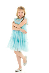 The little girl folded her hands around her face.